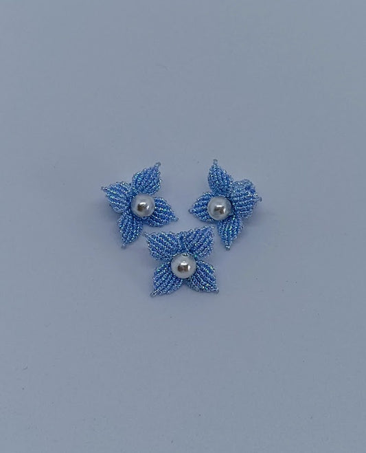 Light blue flower with pearl