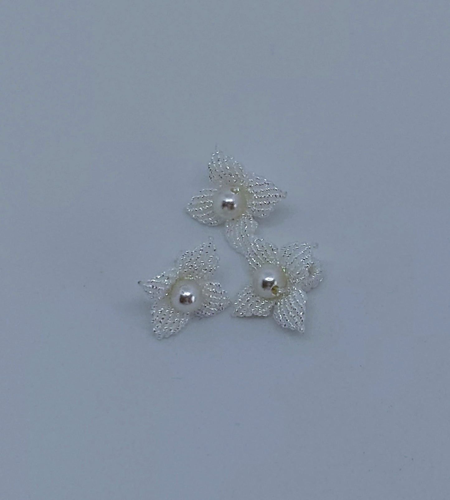 White flower with pearl